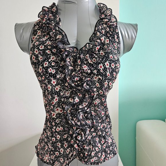 This effortlessly cheerful ruffled halter top makes every day feel like Spring L - Picture 1 of 3